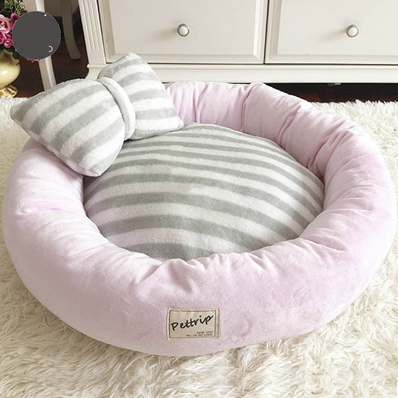 Alfombrilla redonda con almohadones para gato rosa