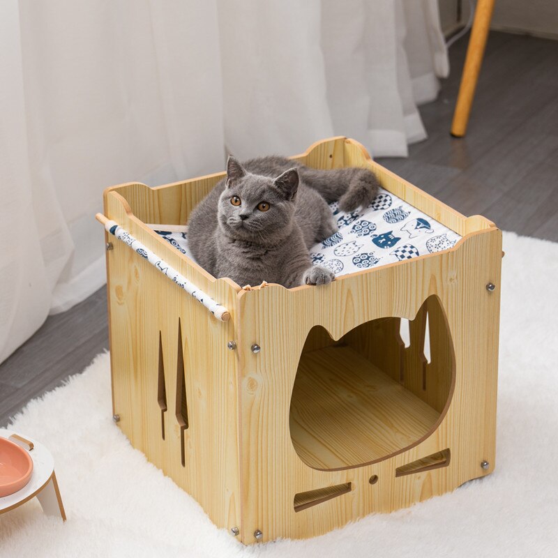 Casa de madera para gatos cómoda